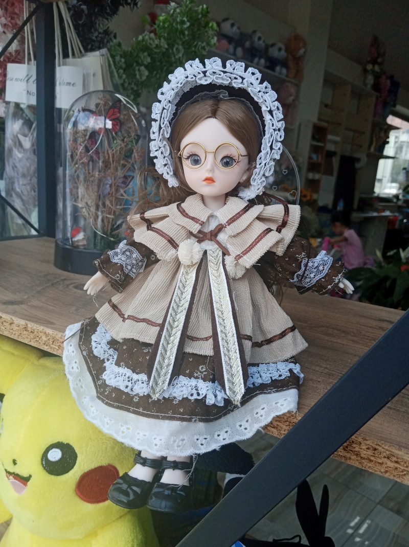 Şapkalı kiz oyuncak bebek 